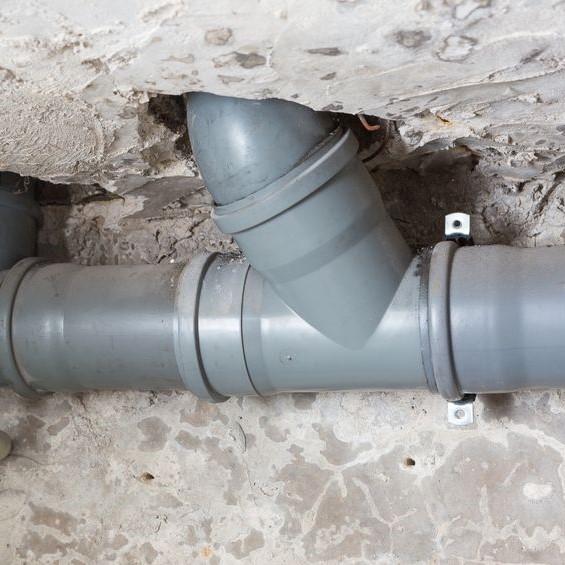 Plumbing system exposed for service